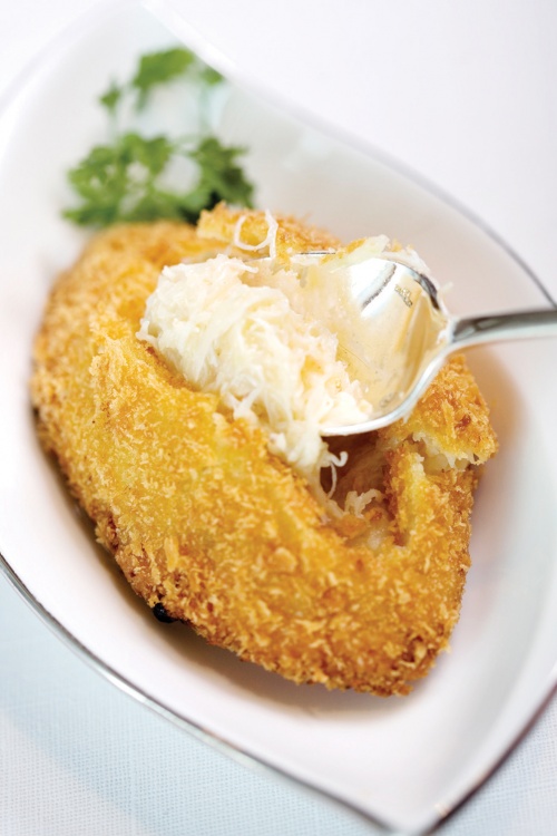 Chef Chan’s popular baked whole abalone puff with diced chicken at Lung King Heen, Four Seasons Hong Kong